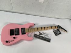 An as new Jackson JS Series Dinky Minion JS1XM, Bubble Gum Pink (no box).
