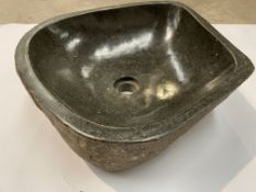 A natural stone sink/basin.
