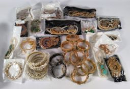 A quantity of assorted Asian costume fahion jewellery to include braclets, necklaces, earrings, ring