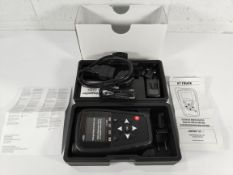 An as new Ateq VT Truck 2.0 professional-grade TPMS diagnostic tool, charger, instructions and OBD I