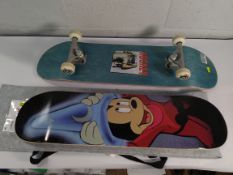 A pre-owned The Skate room Disney Fantasia sorcerers hat deck and Enuff 'Hockey' skate board