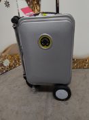 A pre-owned Airwheel SE3S ride on electric suitcase with battery.