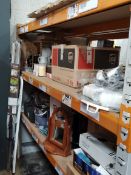 Two shelves of household items and related.