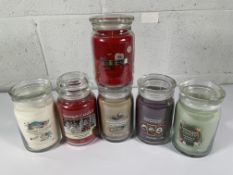 Five assorted Yankee Candles (567ml x 4, 623g x 1) and one Wickford & Co.
