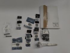 As new bundle of fourteen Triumph motorbike spare parts; 2x T1130245, 3x T1130247, 2x T1130250, 2x T