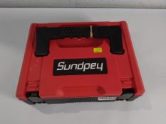 A pre-owned Sundpey RMWRH002 cordless impact wrench kit with 21v 4.0Ah battery.