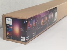 An as new Philips Hue Signe Gradient Floor Lamp in Oak (REF: 8719514445291).