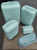 As new set of four suitcases with one carry bag, pepper mint green (brand unknown).