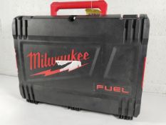A pre-owned Milwaukee M18 Fuel compact impact wrench, with two 5.0Ah batteries and a charger (REF: M