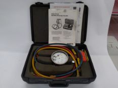 Pre-owned Watts TK-9A model A backflow preventer test kit in original case.
