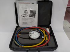 Pre-owned Watts TK-9A model A backflow preventer test kit in original case.