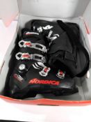 A pair of pre-owned Nordica the cruise ski boots (possibly UK 6).