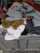 A quantity of assorted pre-owned clothing and related (stillage not included).