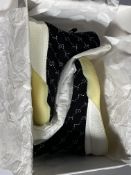 A pair of Stella McCartney sock shoes (Size 35).