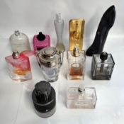 Fifty six perfumes/testers and related to include Boss, Paco Rabanne, Armani, Givenchy and Marc Jaco