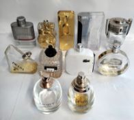 Fifty six perfumes/testers and related to include Paco Rabanne, Givenchy, Boss, Dior and Marc Jacobs