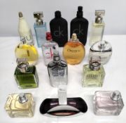 Thirty Calvin Klein perfumes/testers and related (please note: bottles may have been used/packaging