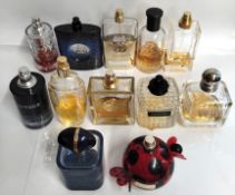 Fifty two perfumes/testers and related to include Estee Lauder, Chanel, Prada, YSL, Boss and Dior (p