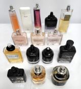 Thirty Givenchy perfumes/testers and related (please note: bottles may have been used/packaging may