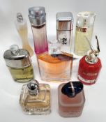 Thirty perfumes/testers and related to include Jean Paul Gaultier, Lacoste, Ghost, Cacharel and more