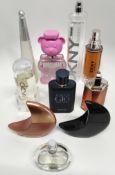 Thirty perfumes/testers and related to include Moschino, Boss, Givenchy, Estee Lauder, D&G, DNKY and