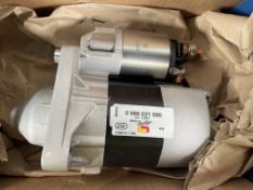 A remanufactured Bosch 0 986 021 590 starter motor.