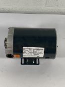 A Century AC motor (serial number 11024J2).