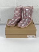 A pair of children's Ugg Classic Short 2 sequin star boots (UK 3).