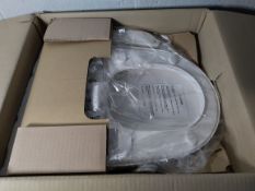 As new Upsa UB-7235U-UE wash and dry bidet rounded style toilet seat. UK adapter required.