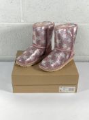 A pair of children's Ugg classic short 2 sequin star boots (UK 3).