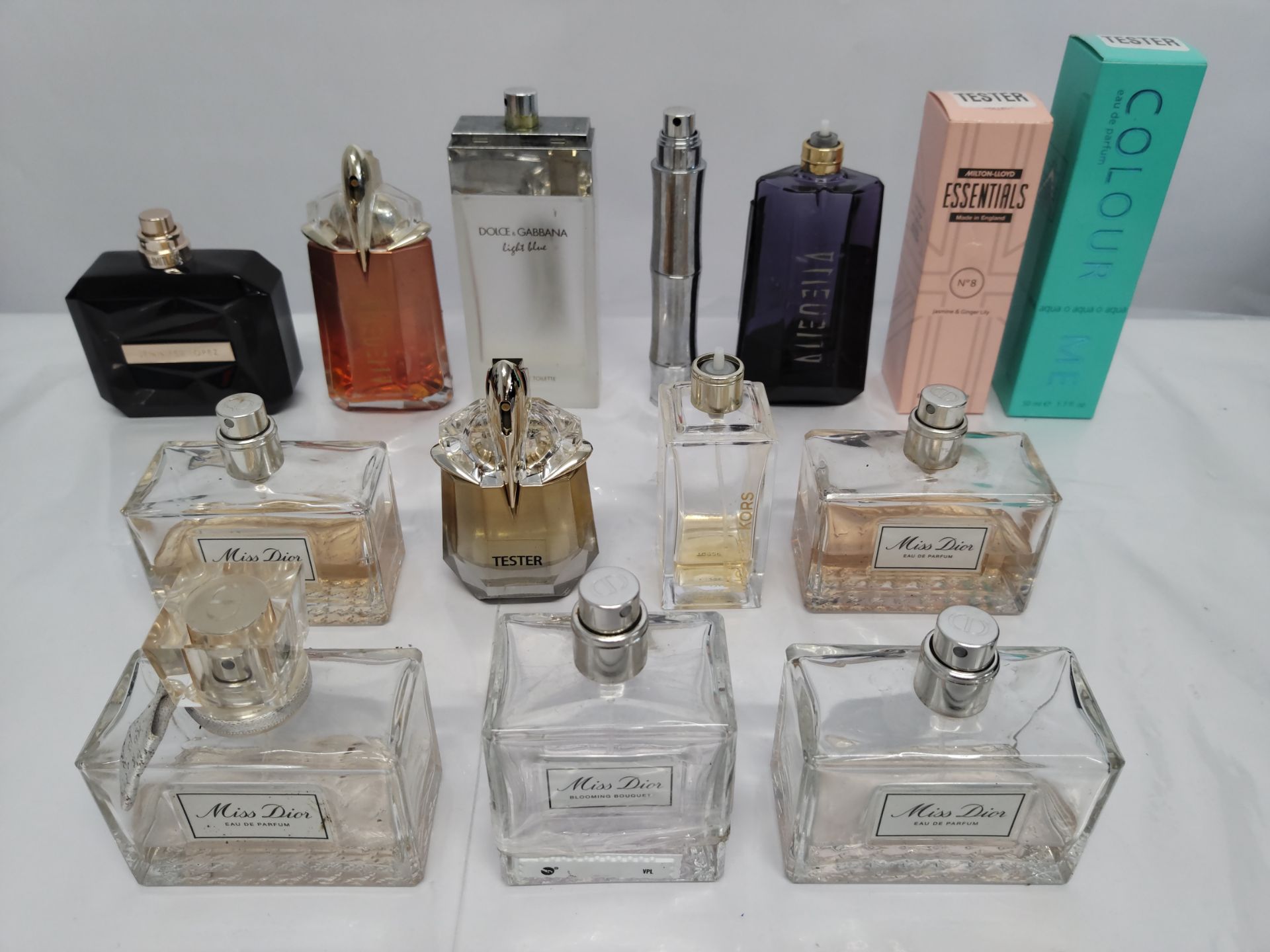 Forty perfumes/testers and related to include Dior, D&G, Michael Korrs, Mugler and more! (please not