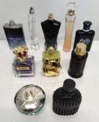 Forty perfumes/testers and related to include Michael Kors, Gucci, Boss, Versace and more (please no