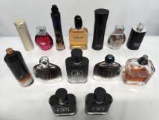 Thirty Armani perfumes/testers and related (please note: bottles may have been used/packaging may ha
