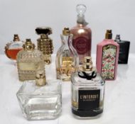 Thirty perfumes/testers and related to include Chanel, Paco Rabanne, Gucci, Jimmy Choo, Armani and m