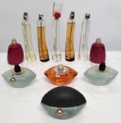 Thirty Kenzo perfumes/testers and related (please note: some bottles may have been used/packaging ma