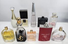 Forty perfumes/testers and related to include Boss, Chanel, Dior, YSL, Gucci and more! (please note: