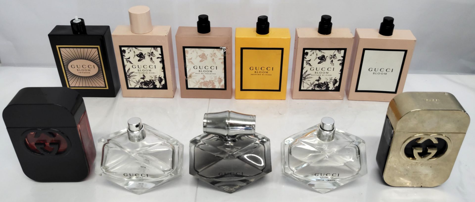 Forty Gucci perfumes/testers and related (please note: bottles have been used/packaging may have dam