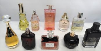 Forty perfumes/testers and related to include Lancome, Dior, Versace, Givenchy and more! (please not