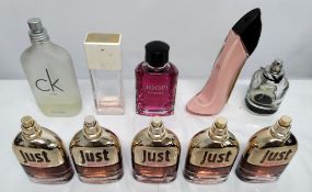 Forty perfumes/testers and related to include Givenchy, Chanel, Roberto Cavalli, Carolina Herrera, J