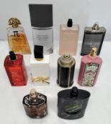 Forty perfumes/testers and related to include YSL, Gucci, Issey Miyake, Boss and more (please note: