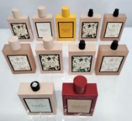 Thirty Gucci perfumes/testers and related (please note: some bottles may have been used/packaging ma