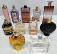 Forty perfumes/testers and related to include Givenchy, Lancome, Prada, Boss and more (please note: