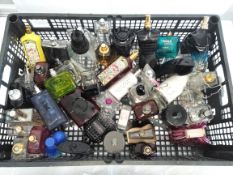 Fifty empty perfume bottles and related to include Gucci, C.K, Armani and Mugler (packaging may have