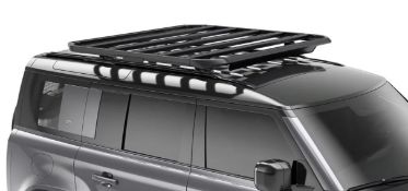 A Thule caprock roof platform XL, box opened. (611004) (stock image)