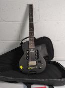 A pre-owned Traveler EG-1 MOD-X electric six string guitar with case.