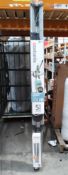An as new Brabantia rotary dryer lift-o-matic advance, 50 metre, with metal ground spike, protective