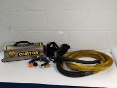 A pre-owned Clayton Hornet vacuum and sander system (May be incomplete, Sold as seen).
