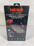 A boxed as new NEBO Ultimate AC Mains Outlet, Jump Starter, Powerbank, Floodlight & Air Compressor.
