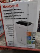 A Honey Well TPFIT20LWK 20l dehumidifier.