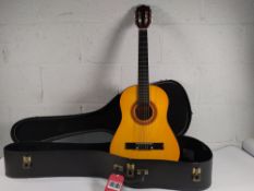A pre-owned Ashville WE34N Acoustic six string guitar with case.